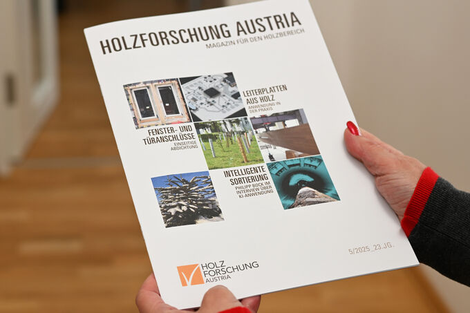 A reader presents the magazine for the wood sector published by Holzforschung Austria.
